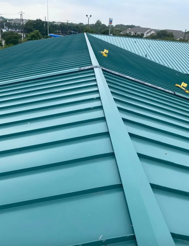 Green commercial metal roof ridge and valley for Metal Roof Repair in Bern